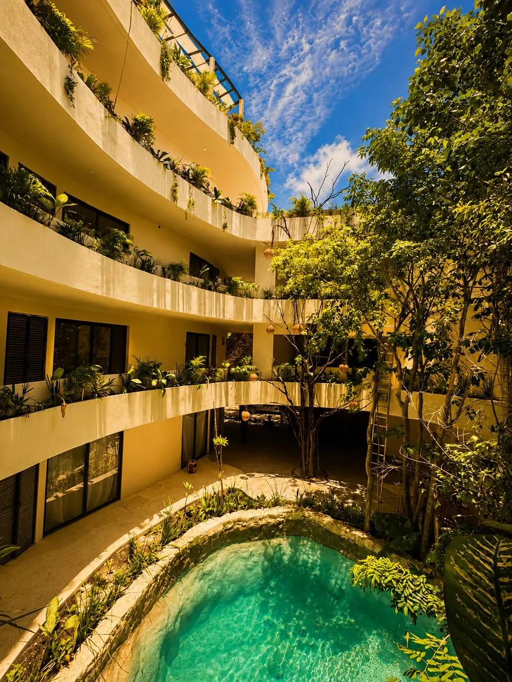 Arquitectura T'son Tulum — jardines en espiral